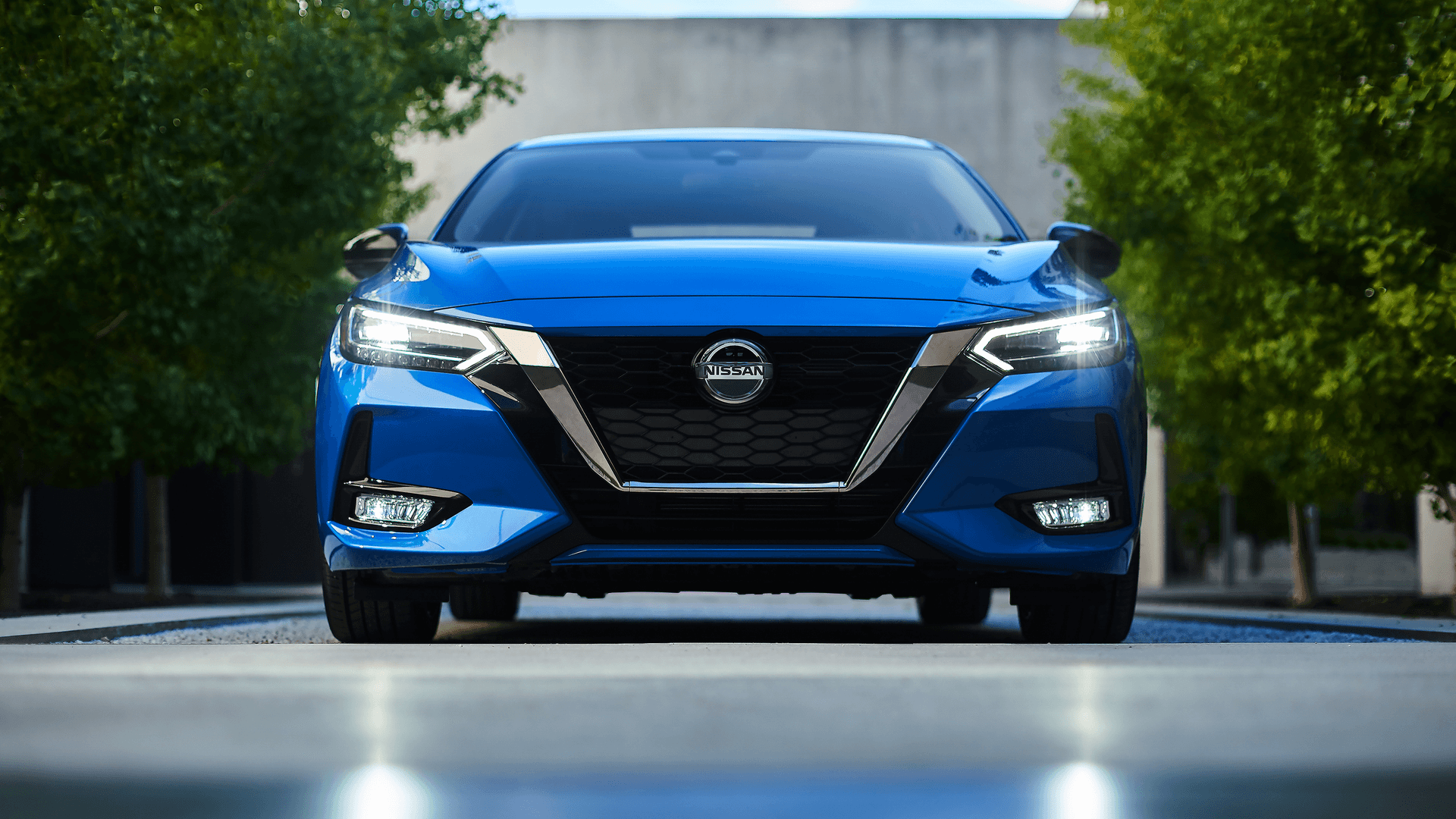 Front view of blue Nissan Sentra